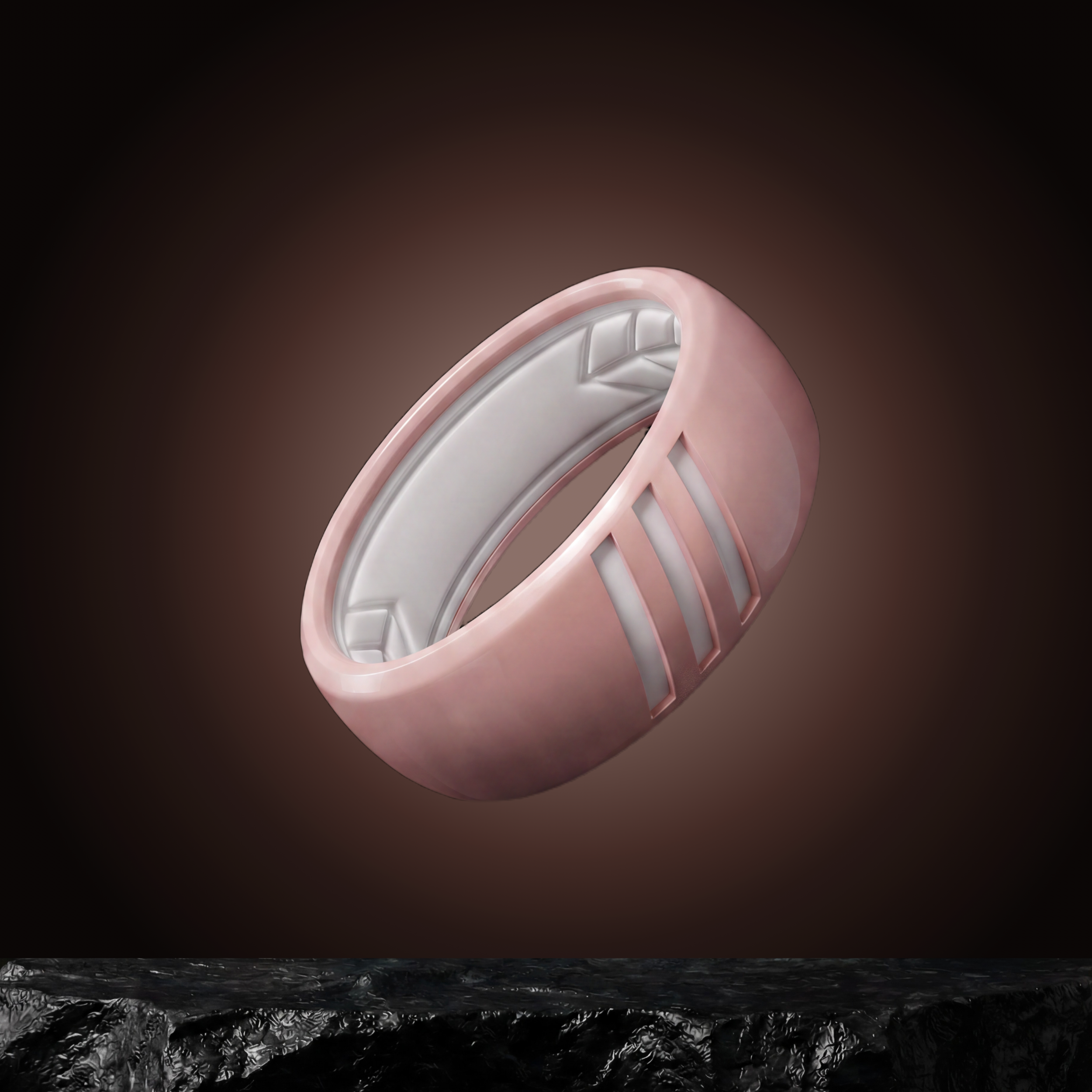 A light pink silicone ring with a white interior.