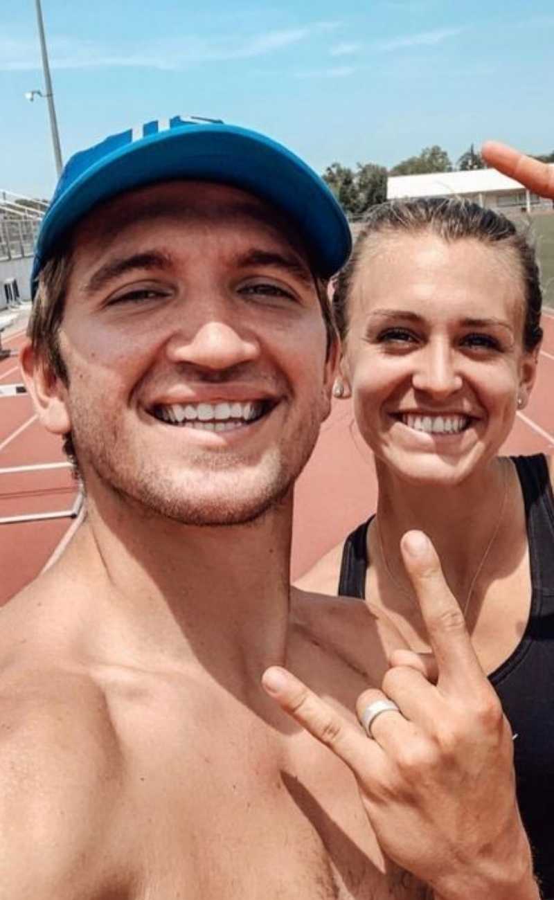 athletic couple smiling working out wearing silicone rings. 
